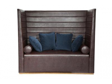 Sofá de cuero con respaldo alto y marco de madera de nogal