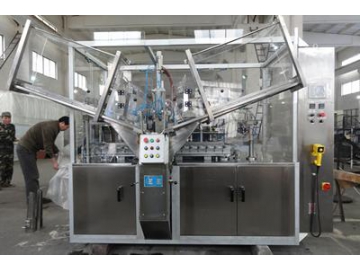 Máquina de cargado y sellado de pasta dental