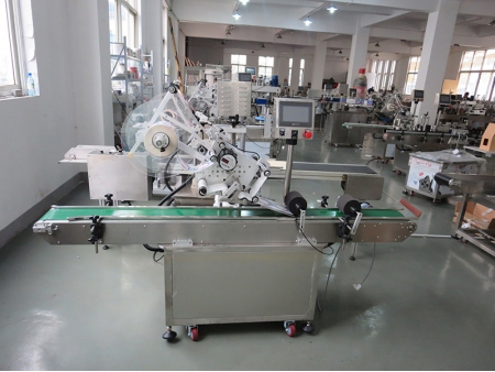 Máquina etiquetadora industrial de botellas automática