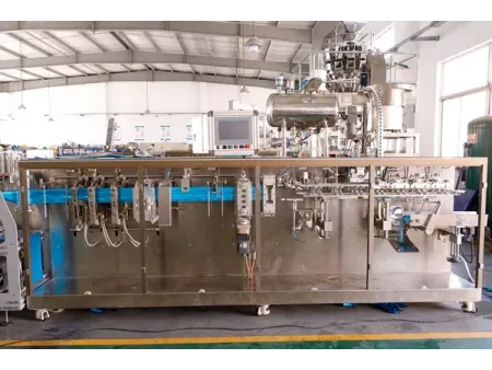 Envasadora horizontal de bolsas stand up con boquilla, llenado con 1 boquilla