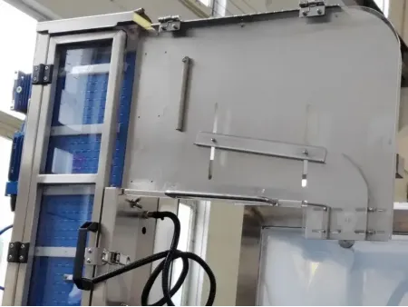 Elevador y alimentador de tapas automático